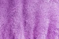Background of soft, fluffy knit fabric. Lilac knitted texture Royalty Free Stock Photo