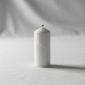 The background is softly blurred, emphasizing the candle as the focal point Royalty Free Stock Photo