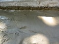 Background of solidifying wet cement on the ground