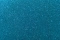 Background with sparkles. Backdrop with glitter. Shiny textured surface. Dark cyan