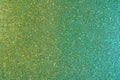 Background with sparkles. Backdrop with glitter. Shiny textured surface. Dark moderate cyan lime green
