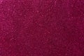 Background with sparkles. Backdrop with glitter. Shiny textured surface. Dark pink Royalty Free Stock Photo