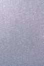 Background with sparkles. Backdrop with glitter. Shiny textured surface. Vertical image. Dark grayish blue Royalty Free Stock Photo