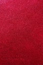Background with sparkles. Backdrop with glitter. Shiny textured surface. Vertical image. Dark red Royalty Free Stock Photo