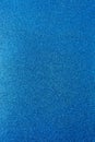 Background with sparkles. Backdrop with glitter. Shiny textured surface. Vertical image. Strong blue Royalty Free Stock Photo