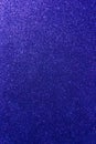 Background with sparkles. Backdrop with glitter. Shiny textured surface. Vertical image. Very dark blue Royalty Free Stock Photo