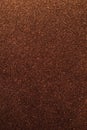 Background with sparkles. Backdrop with glitter. Shiny textured surface. Vertical image. Very dark red Royalty Free Stock Photo