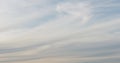 Background of spindrift clouds on evening sky