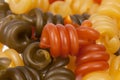 Background of spiral pasta trottole tricolore,