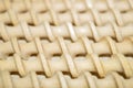 Background of spiral wooden curlers stacked in straight rows