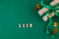 Background for St. Patrick's Day. Good luck symbols. Gold coins and clover shamrock on a green background. Place for Royalty Free Stock Photo