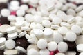 background of stack and pile of colorful medical pills, white pills, brown and pink medications Royalty Free Stock Photo