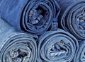 Background of stack rolled jeans Royalty Free Stock Photo