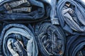 Background of a stack rolled jeans