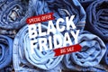 Background of a stack rolled jeans. Black friday sale - Image Royalty Free Stock Photo