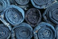 Background of a stack rolled jeans Royalty Free Stock Photo
