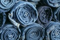 Background of a stack rolled jeans Royalty Free Stock Photo