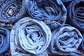 Background of a stack rolled jeans vintage - Image Royalty Free Stock Photo