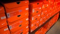 Background of stacked Nike shoes boxes