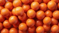 Background of Stacked Orange Golf Balls. Sport. Full Frame. Close-up Royalty Free Stock Photo