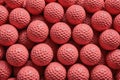 Background of Stacked Pink Golf Balls. Sport. Full Frame. Close-up Royalty Free Stock Photo