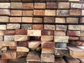 Background of Stacked Wood Cut in Squared Timber Royalty Free Stock Photo