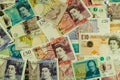 Background of sterling banknotes scattered