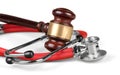 Gavel and stethoscope on background, symbol photo