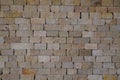 Background stone hands made ancient stones wall restoration facade square wallpaper