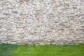 Background of stone wall with grass Royalty Free Stock Photo