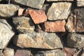 Background texture. Old stone wall lit by the sun