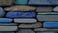 Background of stone wall texture photo. Close up of colorful stone wall.