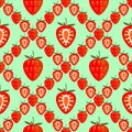 Background with strawberries, whole and half, over green backdrop