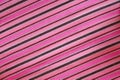 Background striped pink fabric. Texture patterns materials. Royalty Free Stock Photo