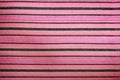 Background striped pink fabric. Texture patterns materials. Royalty Free Stock Photo