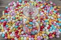 Background of sugared almonds color blue, rose, green, yellow, beige and white.Almond candies. Colorful candies background top