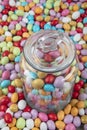 Background of sugared almonds color blue, rose, green, yellow, beige and white.Almond candies. Colorful candies background top