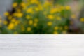 Background summer abstraction, light table and green-yellow blurred background