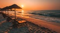 Background, sunrise, ocean, beach, sunbeds, umbrellas Royalty Free Stock Photo