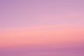 Background of sunrise sky with gentle colors of soft clouds. Dawn sky with colorfull clouds. Royalty Free Stock Photo