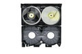 Background surface of inside open video home system VHS tape reels and plastic tray isolated on white background Royalty Free Stock Photo