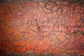 Background surface is red, terracotta with finely cracked paint, small cracks on the painted wall, craquelure Royalty Free Stock Photo