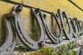 Background surface of very old and rusty horseshoes placed near the wall Royalty Free Stock Photo