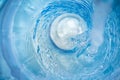 Background with a swirl of blue clear pouring water Royalty Free Stock Photo