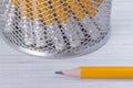 background on the table, in the Cup holder and erasers close-up of a pencil point Royalty Free Stock Photo