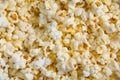 Background of tasty butter popcorn. Yellow and white Royalty Free Stock Photo