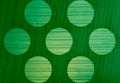 Background texture gradations and circle pattern on green plastic Royalty Free Stock Photo