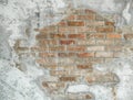Background texture of aged cracked concrete and brick wall Royalty Free Stock Photo