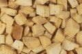 Background texture of baked crackers. heap small pieces dried bread. crumbs of bread croutons