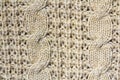 Background texture of beige pattern knitted fabric made of cotton or wool closeup Royalty Free Stock Photo
